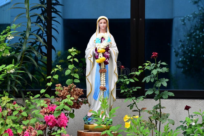 Close up of Statue of Our lady of grace virgin Mary in the church, Thailand. selective focus.