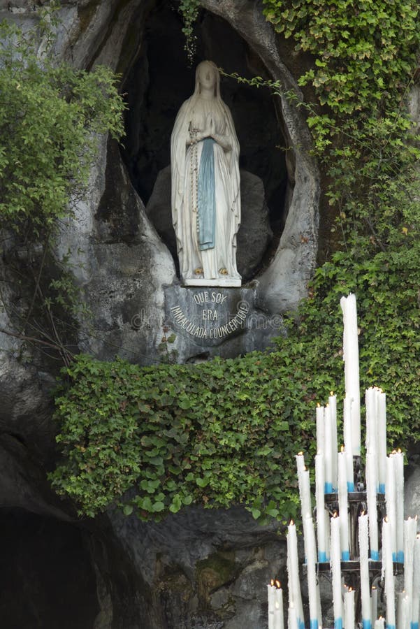 Statue of Our Lady of Immaculate Conception with a Rosary in the Grotto ...