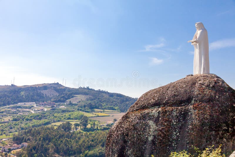 Statue of Our Lady overlooking the landscape stock photos Statue of Our Lady overlooking the landscape stock photos