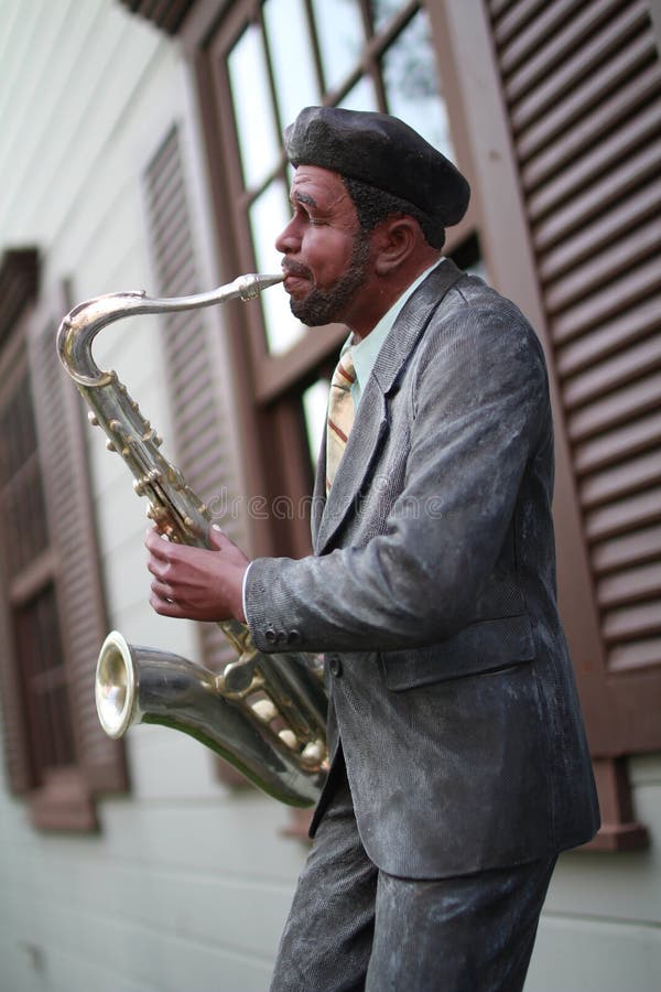 Statue playing musical editorial stock image. Image of happily 40231429