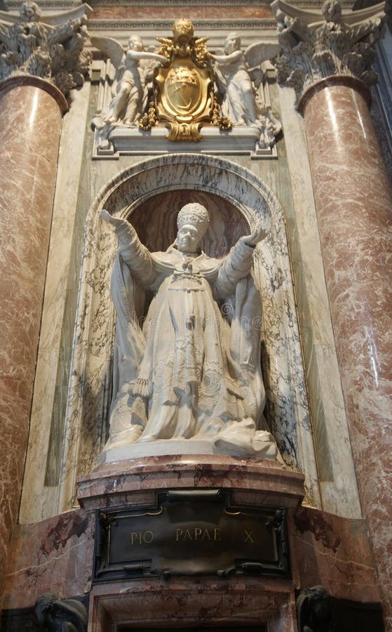 Statue of pope Pio X in St. Peter's Basilica. stock image