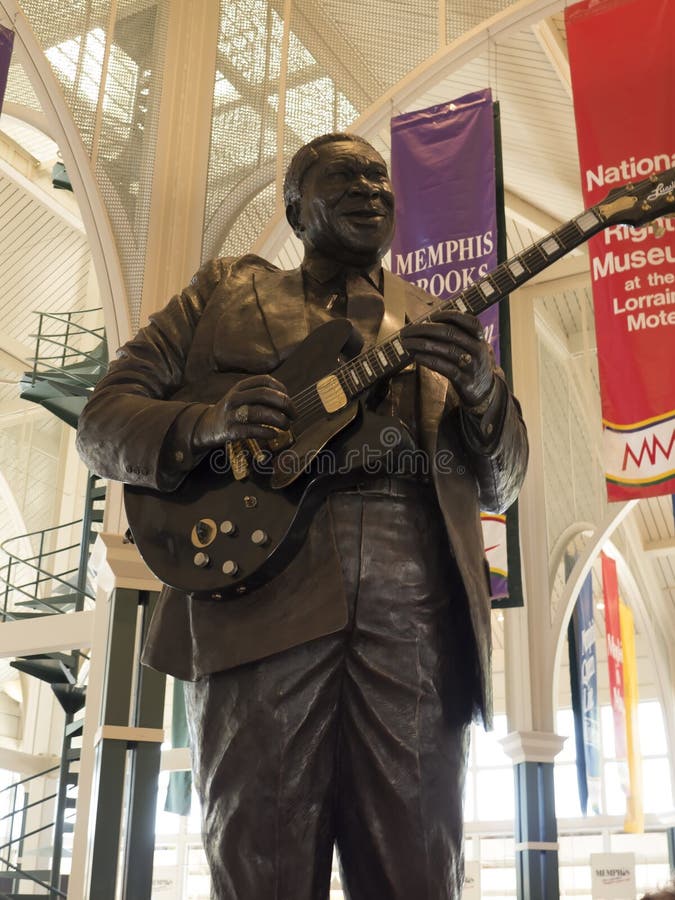 Statue of Rock and Roll Legend BB King in Memphis Visitors Centre in Tennessee USA. Memphis Visitors Centre Tennessee USA by the Mississippi River and the Dolly stock photography Statue of Rock and Roll Legend BB King in Memphis Visitors Centre in Tennessee USA. Memphis Visitors Centre Tennessee USA by the Mississippi River and the Dolly stock photography