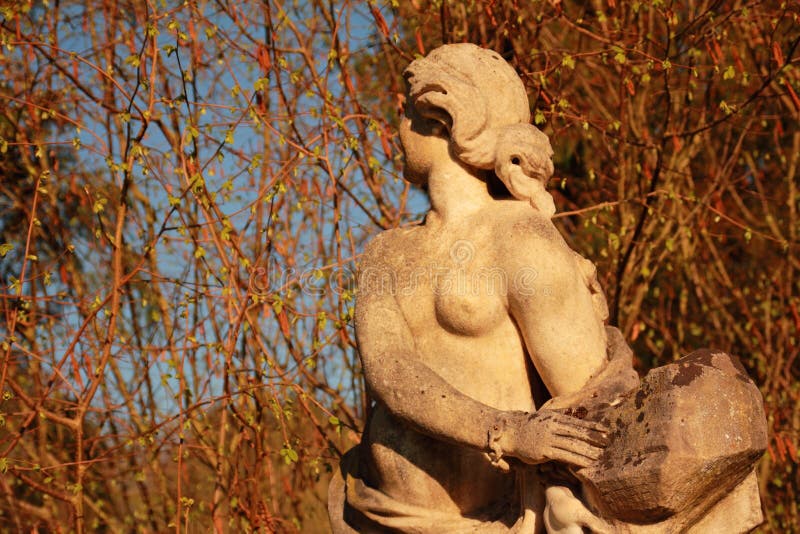 Statue of a virgin at the palace garden of castle Rauischolzhausen (belonging to University of Giessen, Hesse, Germany).