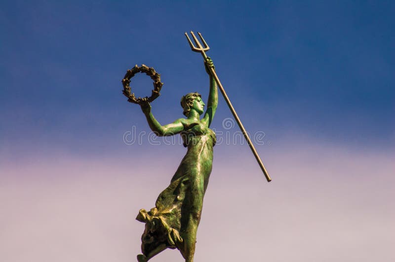 Statue of Woman with pitchfork