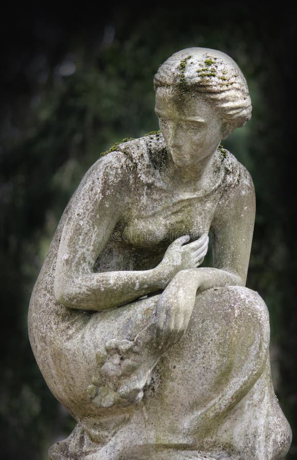 Statue Of Women On Tomb