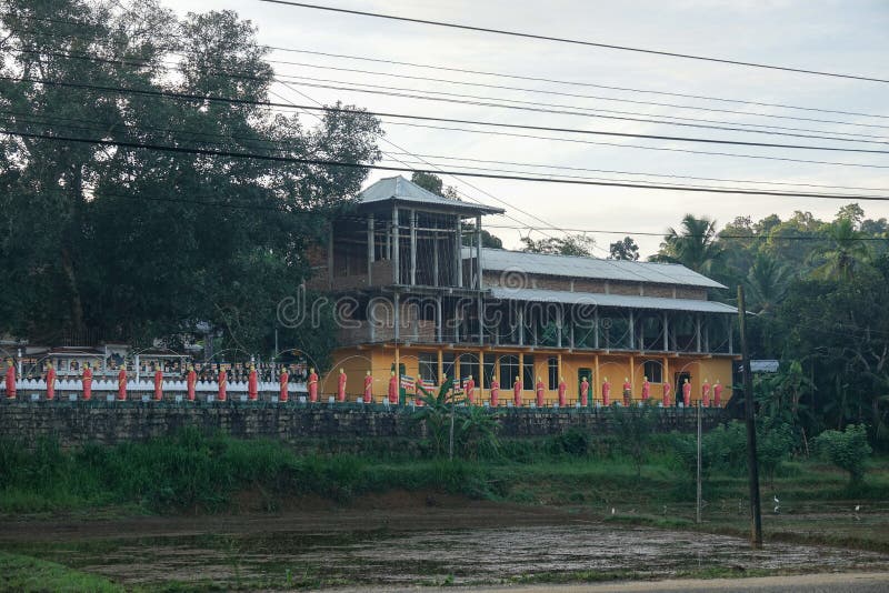 Statues of Monks Standing in a Row in One of the Temples of Sri Lanka