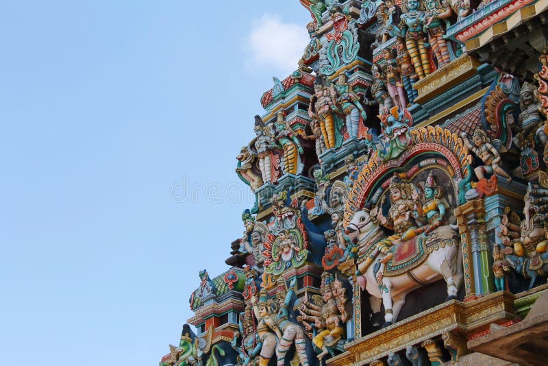 Statues at Madurai Meenakshi Amman temple tower. This is a dravidian style temple located in southern part of India. This is also called Meenakshi sundareswarar temple. Statues at Madurai Meenakshi Amman temple tower. This is a dravidian style temple located in southern part of India. This is also called Meenakshi sundareswarar temple