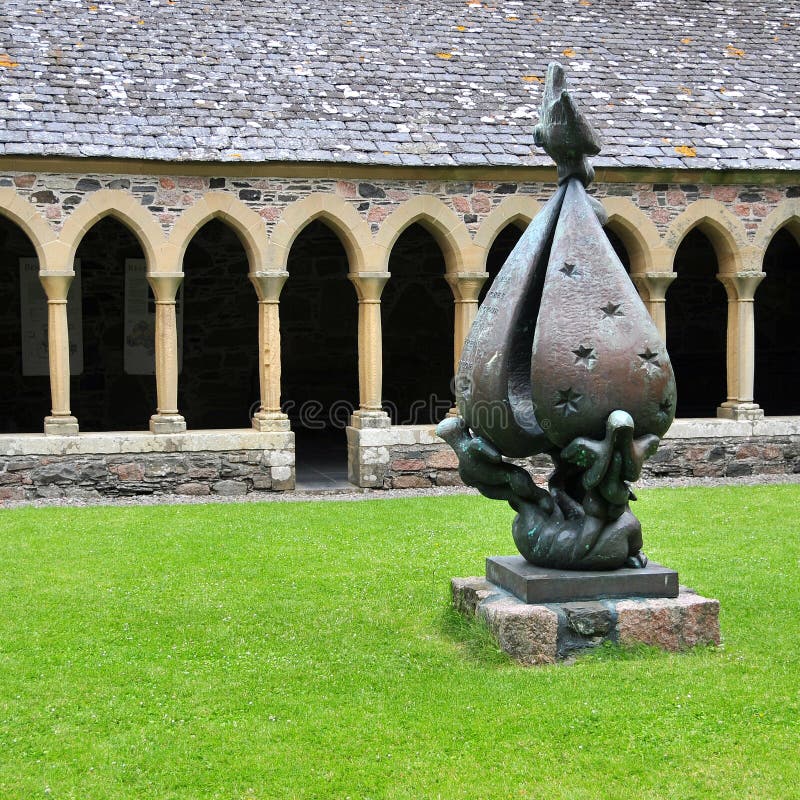 Statue at 'Descent of the Spirit’ Iona Abbey Cloister, Iona, Argyll and Bute, Scotland, U. K Iona Abbey is an abbey located on the island of Iona, just off the Isle of Mull on the West Coast of Scotland. It is one of the oldest Christian religious centres in Western Europe. The abbey was a focal point for the spread of Christianity throughout Scotland and marks the foundation of a monastic community by St. Columba when Iona was part of the Kingdom of Dál Riata. Saint Aidan served as a monk at Iona, before helping to re-establish Christianity in Northumberland, on the island of Lindisfarne. Iona Abbey is the spiritual home of the Iona Community, an ecumenical Christian religious order, whose headquarters are in Glasgow. The Abbey remains a popular site of Christian pilgrimage today. This sculpture is ‘Descent of the Spirit’ by Jacques Lipchitz and was given to the Abbey The sculpture shows the Virgin supported in a starry cloud descending to earth, represented by animals, birds and humans, and carried by the Holy Spirit, a Dove. Pillar column garden stock images, royalty-free photos and pictures