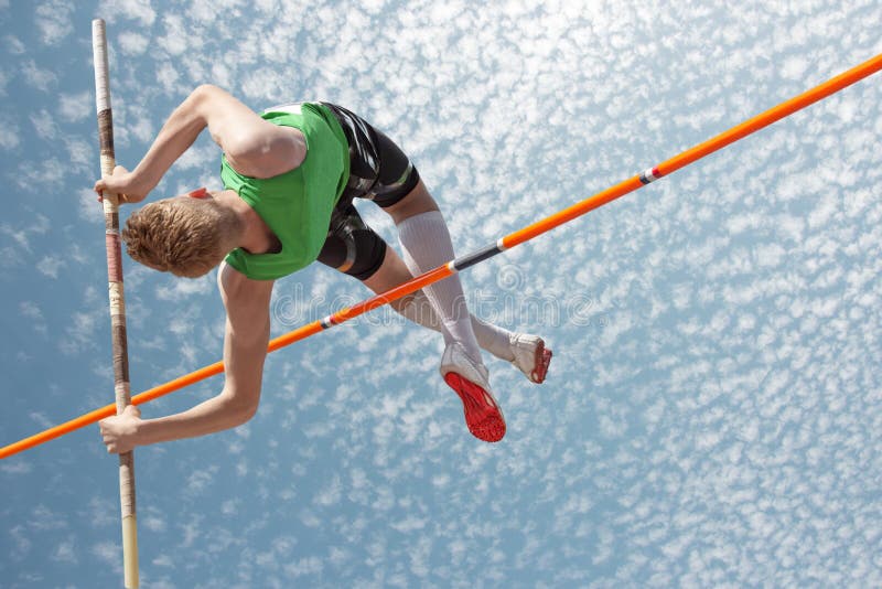 Young athletes pole vault seems to reach the sky. Young athletes pole vault seems to reach the sky