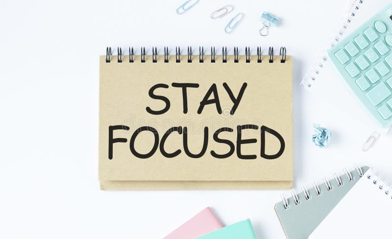 STAY FOCUSED man hand notebook and other royalty free stock photo