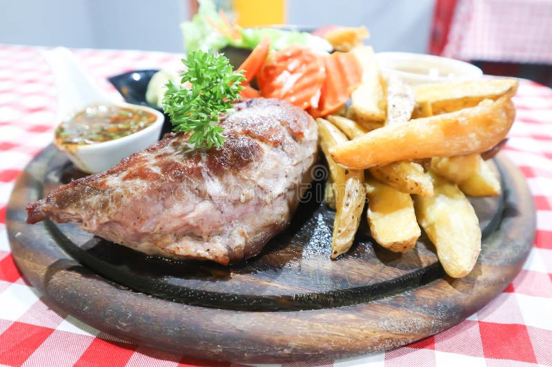 Steak, Beef Steak with French Fries or Fried Potato and Salad Stock