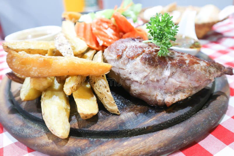 Steak, Beef Steak with French Fries or Fried Potato and Salad Stock