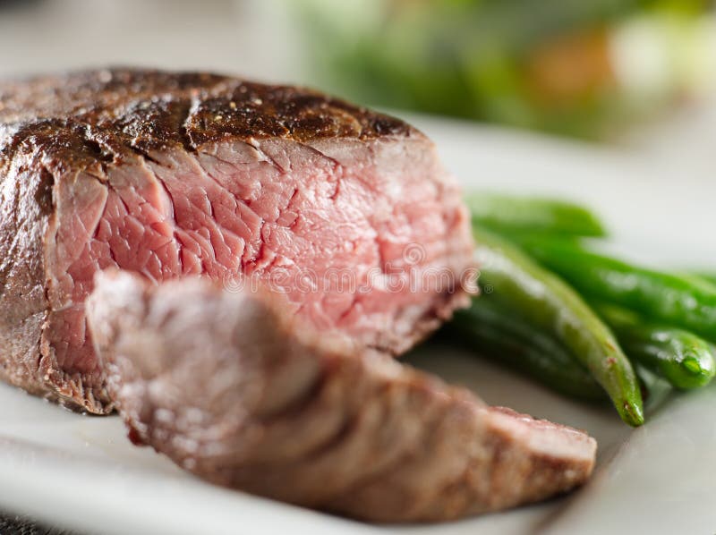 Steak cooked rare closeup stock photo. Image of bloody 23603934