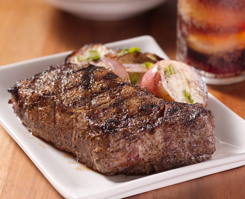 Steak dinner with potatoes stock image. Image of restaurant - 20178133