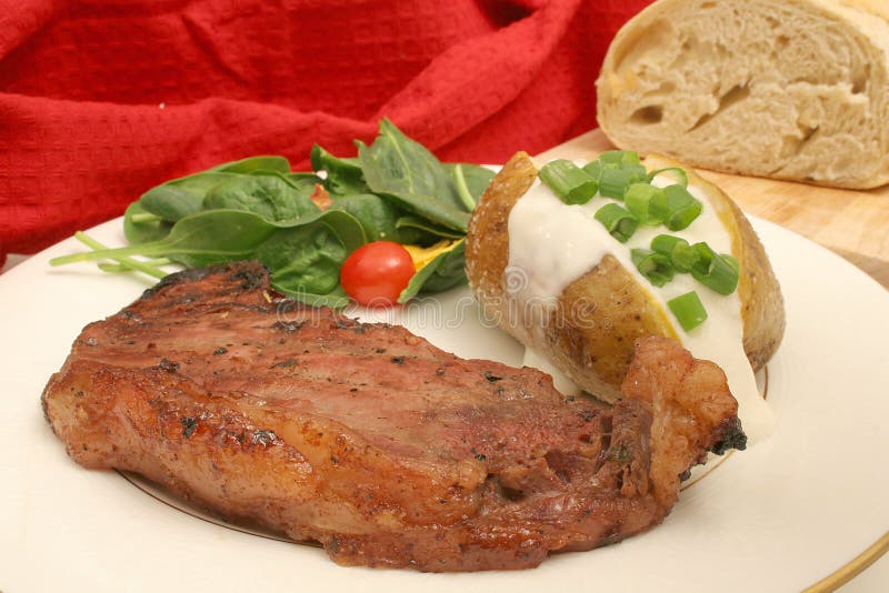 Steak dinner on white