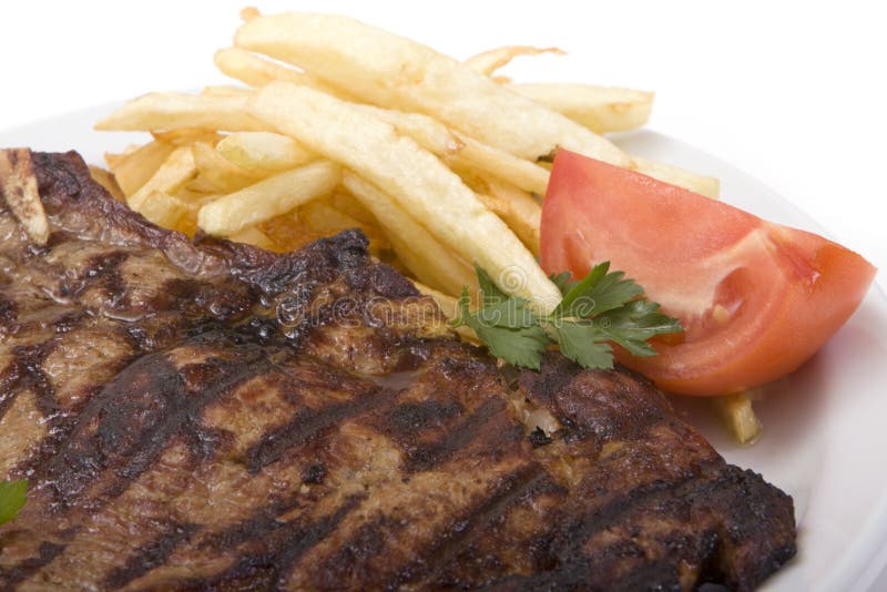 Steak and fries stock photography