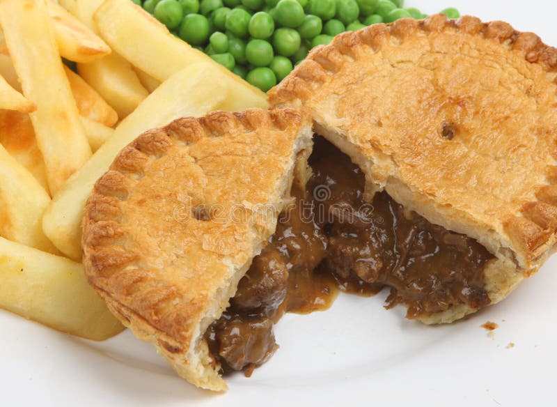 Steak & kidney pie with chips and peas