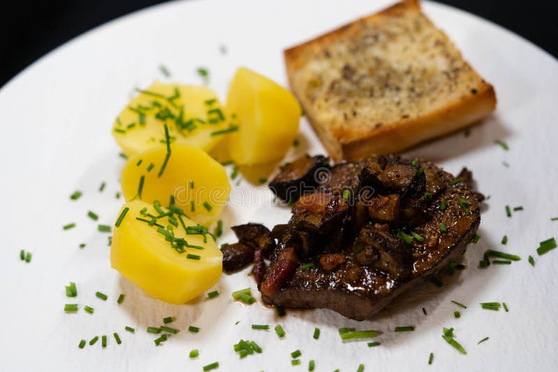 Steak with mushrooms stock photo. Image of healthy, mignon 261699390