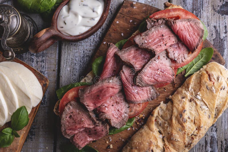 Steak Sandwich, Sliced Roast Beef, Cheese,spinach Leaves,tomato Stock