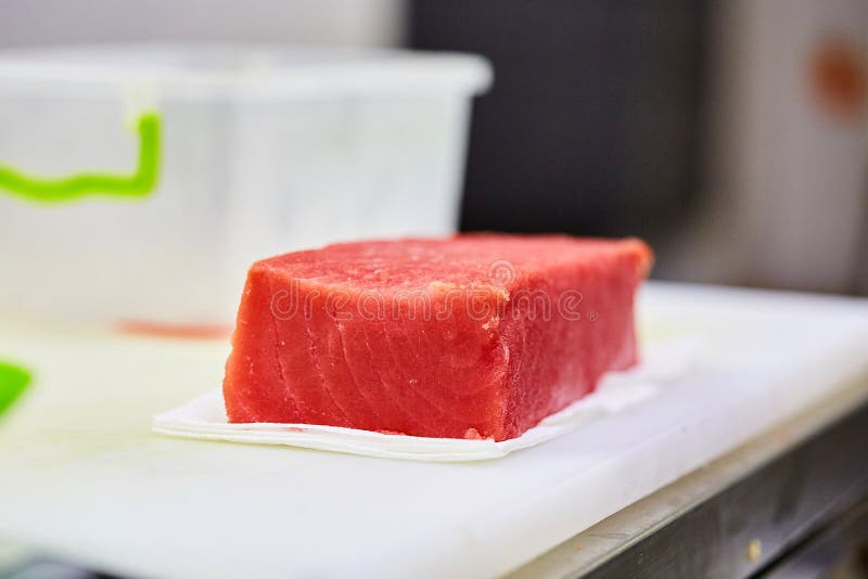 Steak of Tuna Fish Fillet on a Cutting Board Fish and Seafood Stock