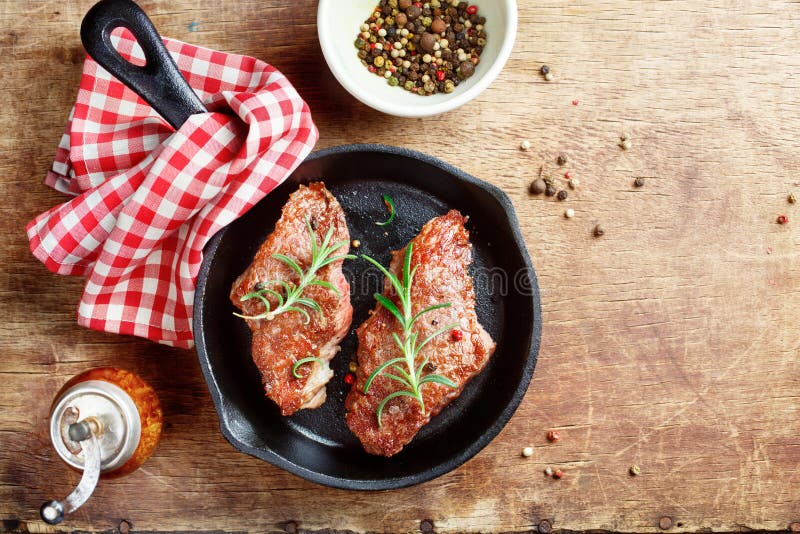 Steaks on Cast Iron Frying Pan Stock Image Image of product, pork