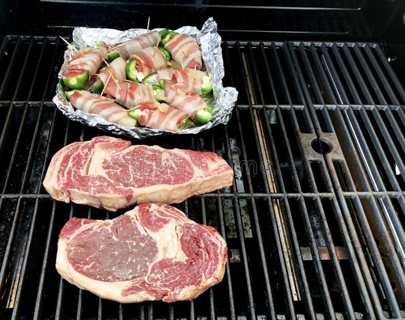 Steaks Cooking on a Gas Grill Stock Photo Image of meat, delicious
