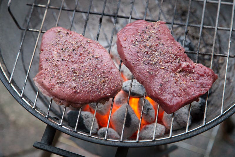 Steaks on Grill with Charcoal Briquettes Stock Image Image of outdoor