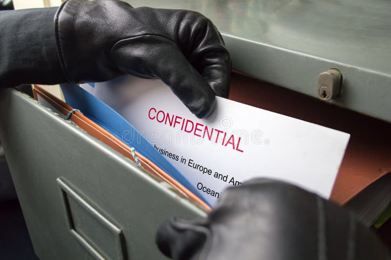 Thief stealing confidential files in an office. Detective paperwork stock images, royalty-free photos and pictures