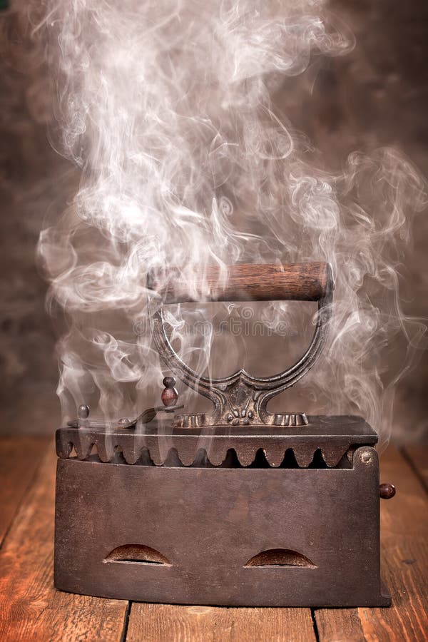 Steam charcoal iron stock image. Image of iron, clothes 37351593