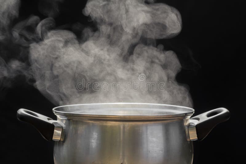 Steam over cooking pot stock image