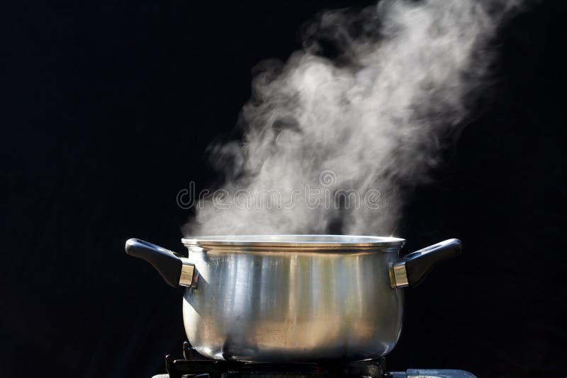 Steam on pot in kitchen. For background Steam on pot in kitchen. For background