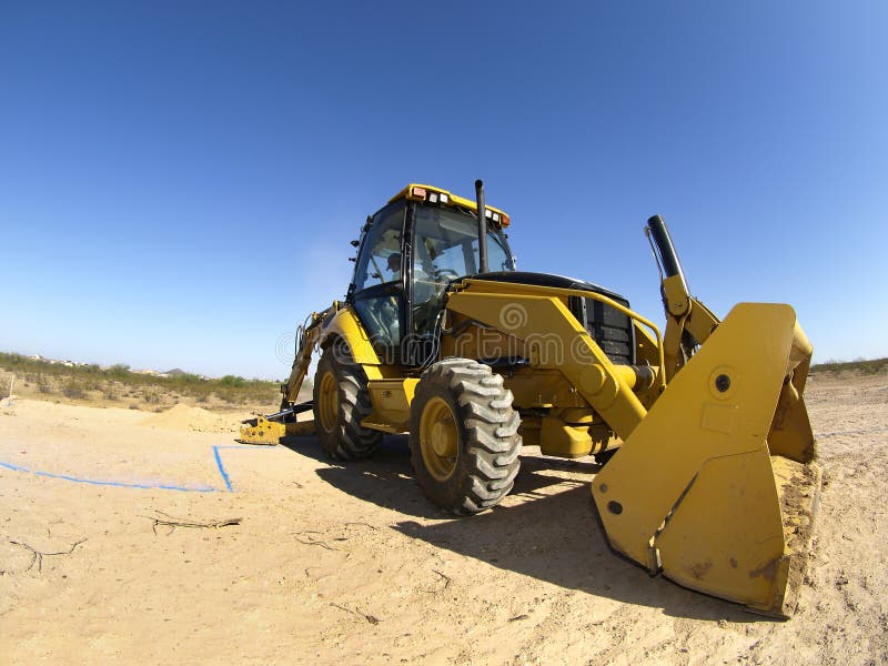 Steam Shovel Digging into the Ground - Horizontal