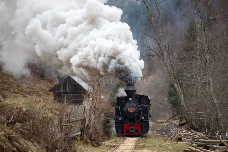 Steam Train Puffing Along The Tracks Editorial Stock Photo Image Of