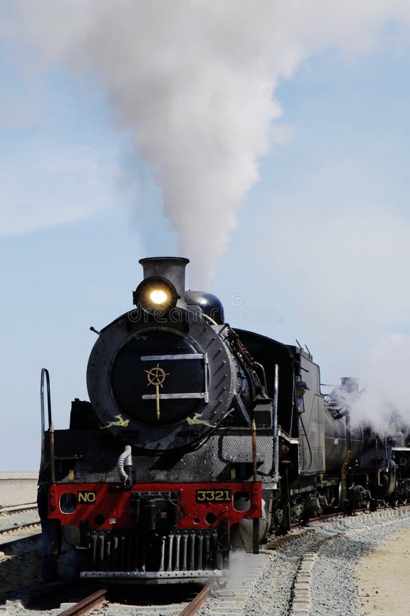 Vintage steam train preparing to depart from Swakopmund station on Namibia's westcoast. Warm steam stock images, royalty-free photos and pictures