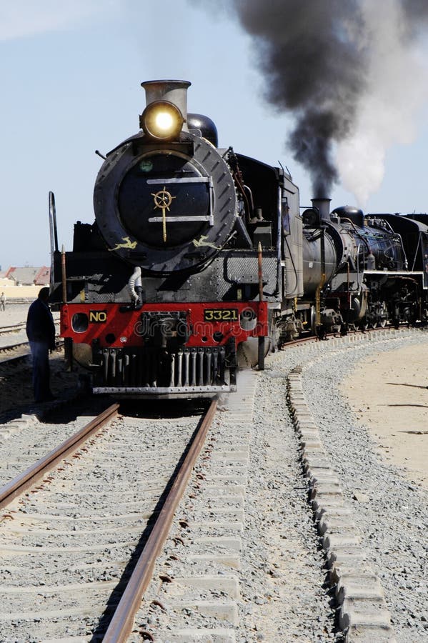 Vintage steam train preparing to depart from Swakopmund station on Namibia's westcoast. Warm steam stock images, royalty-free photos and pictures