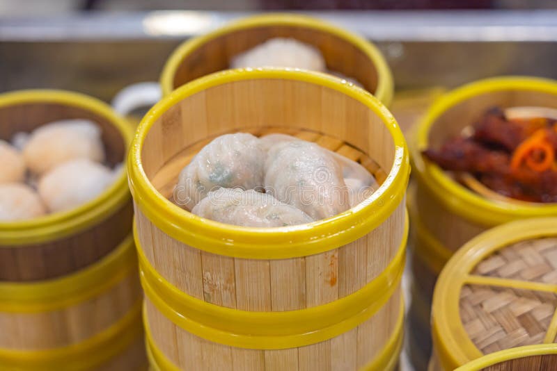 Steamed Crystal Dumplings In Bamboo Steamer Box In Chinese Restaurant