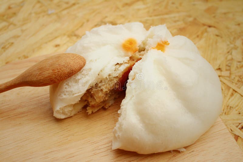 Steamed Dumpling Chinese Bun on Brown Background. Stock Image Image