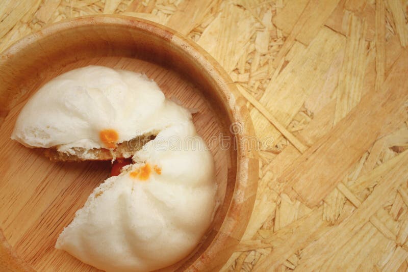 Steamed Dumpling Chinese Bun on Brown Background. Stock Image Image