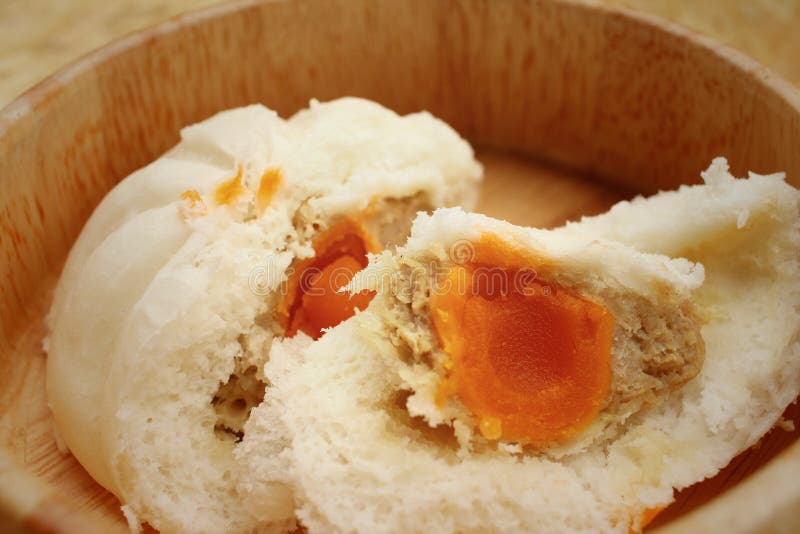 Steamed Dumpling Chinese Bun on Brown Background. Stock Photo Image