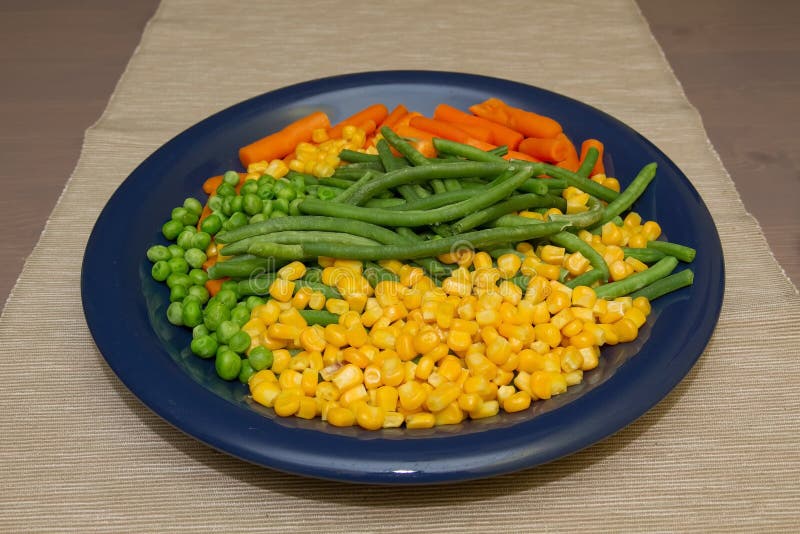 Steamed Organic Vegetable Medly with Peas, Corn, Beans, and Carrots