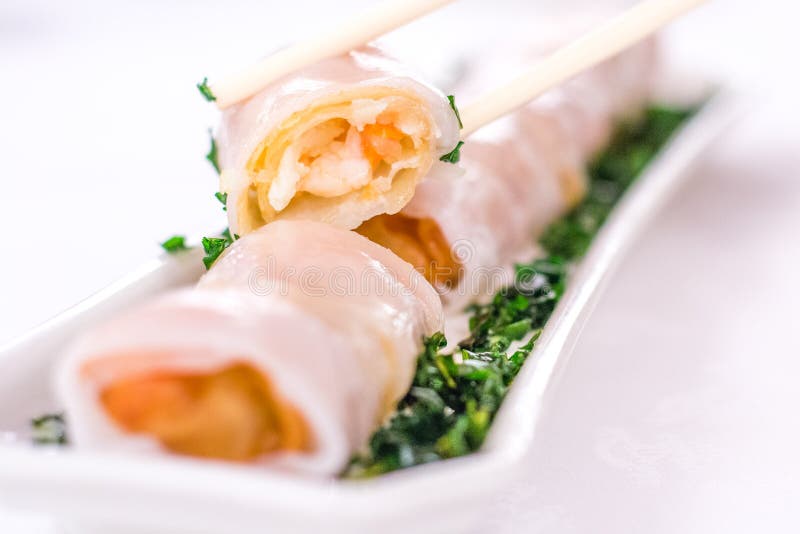 Steamed Rice Flour Roll with Deepfried Shrimp Spring Roll Stock Photo