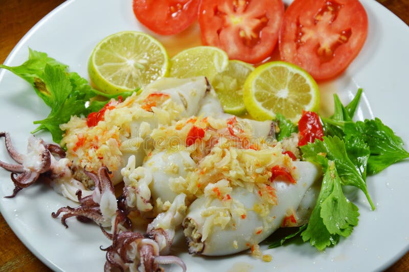 Steamed Squid Stuffed Minced Pork Dressing Spicy Lemon Sauce on Plate
