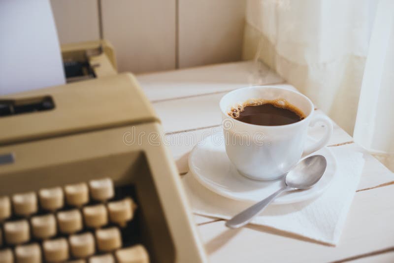 Vintage Looking Coffee and Typing Machine on a Desk Stock Image Image