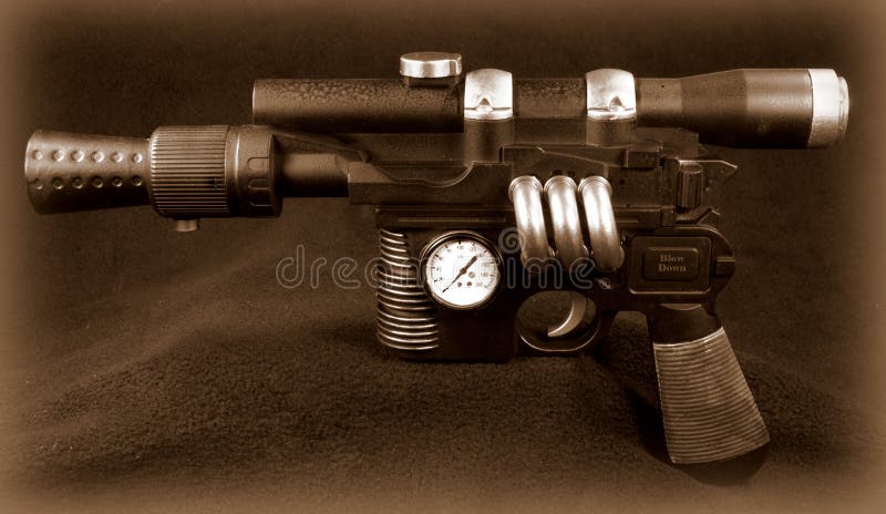 Prop automatic pistol altered to look as if it is powered by steam, in old sepia tone. Prop automatic pistol altered to look as if it is powered by steam, in old sepia tone.