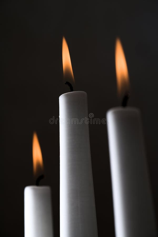 Simple white candles with dark background. Canon 5D, Sigma 2,8/150, raw. Simple white candles with dark background. Canon 5D, Sigma 2,8/150, raw.