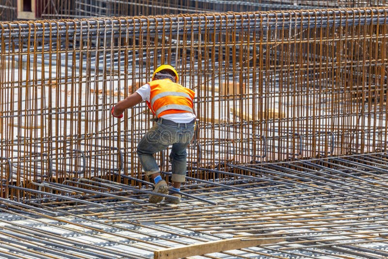 Steel Fixer Tying Steel Reinforcement Cage Together Stock Image Image steel-fixer-tying-steel-reinforcement-cage-together-stock-image-image