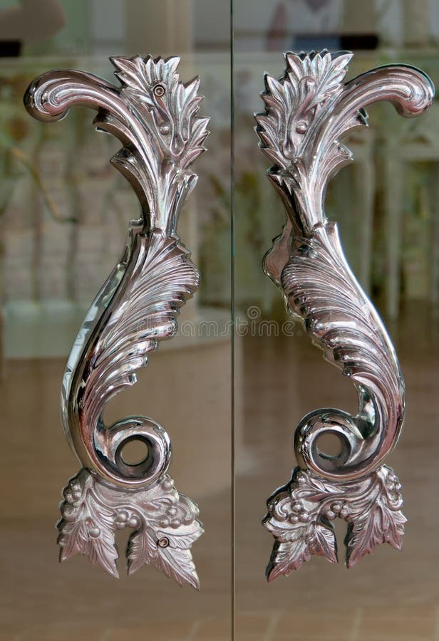 Steel handles on the doors stock image. Image of handle 22762917