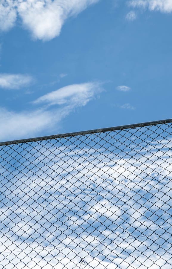 Steel Net Fence Against Blue Sky Stock Photo - Image of ...
