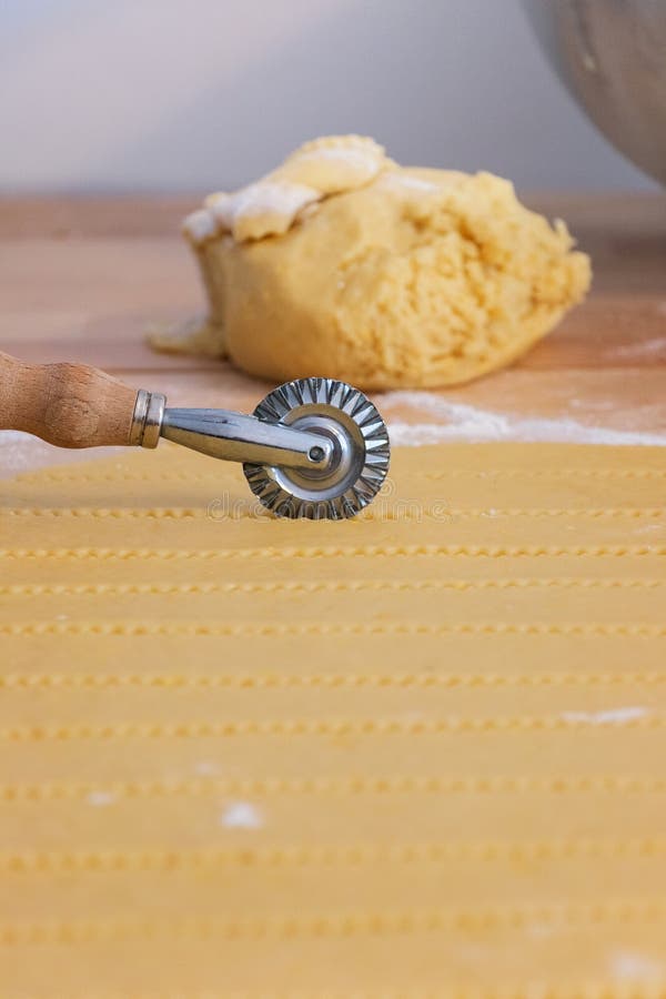 Cutter Wheel On A Puff Pastry Layer Stock Photo - Download Image