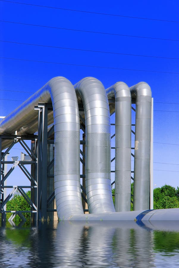 Steel pipe-line is photographed on sky background